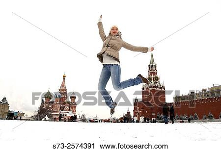 Young woman jumping on the Red Square in Moscow, Russia View Large Photo Image Stock Image - Young woman jumping on the Red Square in Moscow, Russia. Fotosearch