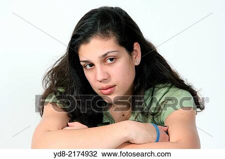 Stock Image - Young woman posing in the Studio. Fotosearch