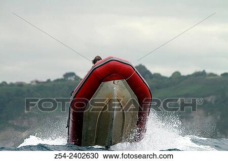 Stock Image - Zodiac boat at Gijon Bay, Asturias Spain.. Fotosearch