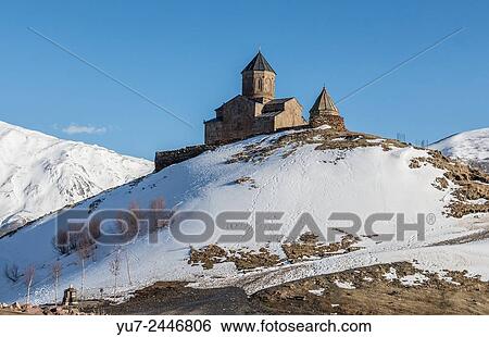 14th century Holy Trinity Church (Tsminda Sameba) near Mount Kazbek in Georgia. View Large Photo Image Stock Photograph - 14th century Holy Trinity Church (Tsminda Sameba) near Mount Kazbek in Georgia.. Fotosearch