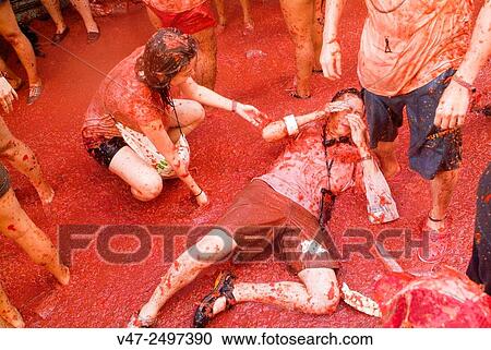 150 tons of tomatoes serve as ammunition for traditional Tomatina, a battle which attracted this year more than 22, 000 people of 96 different nationalities to launch a record number tomatoes. Buñol, Valencia province, Spain. View Large Photo Image Stock Image - 150 tons of tomatoes serve as ammunition for traditional Tomatina, a battle which attracted this year more than 22, 000 people of 96 different nationalities to launch a record number tomatoes. Buñol, Valencia province, Spain.. Fotosearch