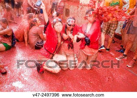 150 tons of tomatoes serve as ammunition for traditional Tomatina, a battle which attracted this year more than 22, 000 people of 96 different nationalities to launch a record number tomatoes. Buñol, Valencia province, Spain. View Large Photo Image Stock Photograph - 150 tons of tomatoes serve as ammunition for traditional Tomatina, a battle which attracted this year more than 22, 000 people of 96 different nationalities to launch a record number tomatoes. Buñol, Valencia province, Spain.. Fotosearch