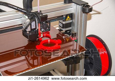 Stock Image - 3 dimensional printer at work. Fotosearch