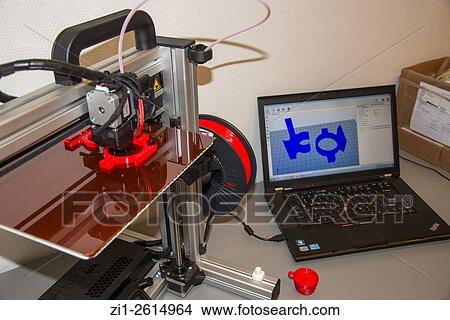3 dimensional printer at work with laptop with graphic model View Large Photo Image Picture - 3 dimensional printer at work with laptop with graphic model. Fotosearch