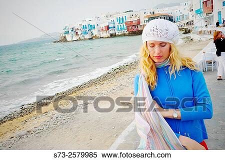 30 years old woman in Little Venice, Mykonos, Cyclades Islands, Greece View Large Photo Image Stock Photography - 30 years old woman in Little Venice, Mykonos, Cyclades Islands, Greece. Fotosearch