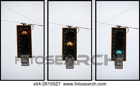 Stock Photo - A bicycle traffic signal shown in all stages of red, yellow, and green.. Fotosearch