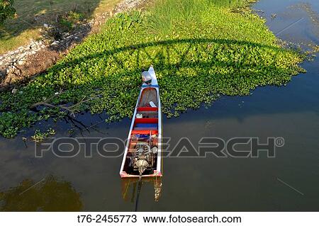 A boat sits under the Death Railway Bridge over the River Kwai, Kanchanaburi, Thailand. View Large Photo Image Stock Image - A boat sits under the Death Railway Bridge over the River Kwai, Kanchanaburi, Thailand.. Fotosearch