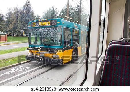 A city bus photographed from a tram in Seattle, Washington, USA. View Large Photo Image Stock Image - A city bus photographed from a tram in Seattle, Washington, USA.. Fotosearch