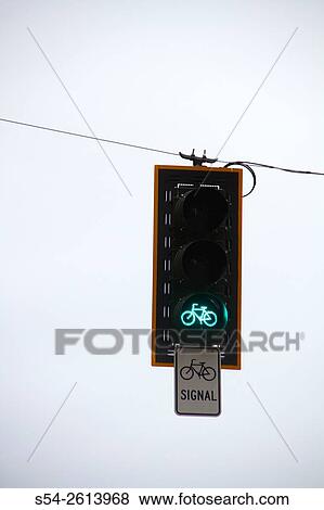 A green bicycle traffic signal in downtown Seattle, Washington, USA. View Large Photo Image Stock Photo - A green bicycle traffic signal in downtown Seattle, Washington, USA.. Fotosearch