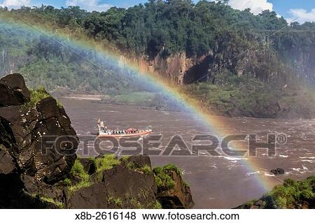 A river boat at the base of the falls, Iguaz Falls National Park, Misiones, Argentina, South America. View Large Photo Image Stock Photo - A river boat at the base of the falls, Iguaz Falls National Park, Misiones, Argentina, South America.. Fotosearch