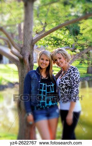 A woman and her daughter outdoors at a park in Spokane, Washington, USA. View Large Photo Image Stock Photo - A woman and her daughter outdoors at a park in Spokane, Washington, USA.. Fotosearch