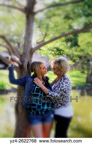 A woman and her daughter outdoors at a park in Spokane, Washington, USA. View Large Photo Image Stock Photo - A woman and her daughter outdoors at a park in Spokane, Washington, USA.. Fotosearch