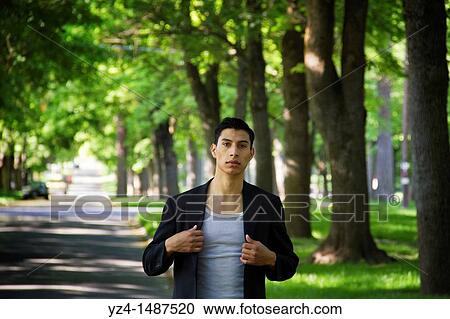 A young Latino man in Spokane, Washington, USA. View Large Photo Image Stock Image - A young Latino man in Spokane, Washington, USA.. Fotosearch