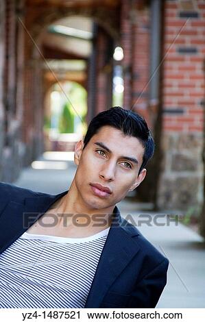 A young latino man outdoors in Spokane, Washington, USA. View Large Photo Image Stock Image - A young latino man outdoors in Spokane, Washington, USA.. Fotosearch