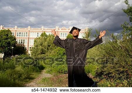 A young male graduate View Large Photo Image Stock Image - A young male graduate. Fotosearch
