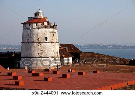 Aguada Fort and lighthouse at he coast in Candolim, Goa, India, Asia. View Large Photo Image Stock Image - Aguada Fort and lighthouse at he coast in Candolim, Goa, India, Asia.. Fotosearch