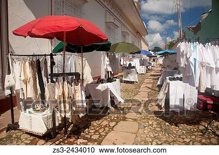 Stock Image - Art and Craft market near the main square Plaza Mayor, Trinidad, Sancti Spiritu Province, Cuba, West Indies, Central America.. Fotosearch