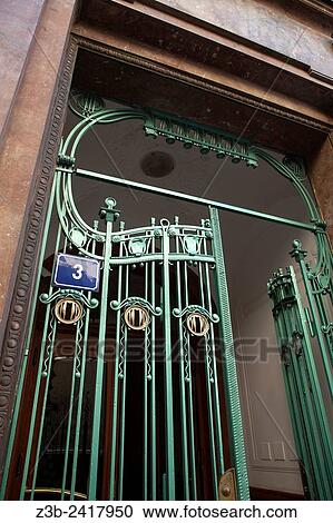 Stock Image - Art Nouveau iron gate in U Prasne Brany Street, behind Obecni Dum, Prague, Czech Republic.. Fotosearch