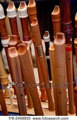 Stock Image - Assorted recorders made of different, exotic woods, made by hand by craftsmen and displayed at an event sponsored by the Boston Early Music Festival.. Fotosearch