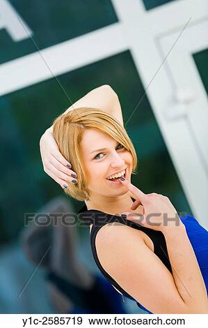 Attractive woman framed lovely portrait teasing View Large Photo Image Stock Photo - Attractive woman framed lovely portrait teasing. Fotosearch