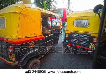 auto-rickshaws in traffic, Bangalore or Bengaluru, Karnataka, India. View Large Photo Image Stock Photography - auto-rickshaws in traffic, Bangalore or Bengaluru, Karnataka, India.. Fotosearch