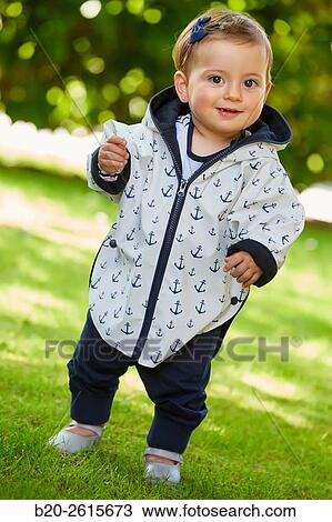 Baby playing in the park. Getaria. Gipuzkoa. Basque Country. Spain View Large Photo Image Stock Image - Baby playing in the park. Getaria. Gipuzkoa. Basque Country. Spain. Fotosearch