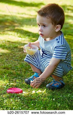 Baby playing in the park. Getaria. Gipuzkoa. Basque Country. Spain View Large Photo Image Stock Photo - Baby playing in the park. Getaria. Gipuzkoa. Basque Country. Spain. Fotosearch