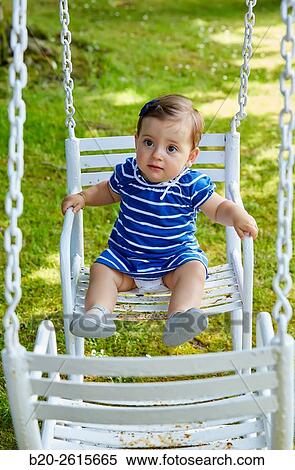 Baby playing in the park. Getaria. Gipuzkoa. Basque Country. Spain View Large Photo Image Stock Photography - Baby playing in the park. Getaria. Gipuzkoa. Basque Country. Spain. Fotosearch