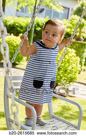 Baby playing in the park. Getaria. Gipuzkoa. Basque Country. Spain View Large Photo Image Stock Photography - Baby playing in the park. Getaria. Gipuzkoa. Basque Country. Spain. Fotosearch