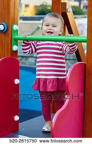 Baby playing in the park. Zumaia. Gipuzkoa. Basque Country. Spain View Large Photo Image Stock Image - Baby playing in the park. Zumaia. Gipuzkoa. Basque Country. Spain. Fotosearch