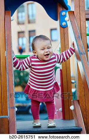 Baby playing in the park. Zumaia. Gipuzkoa. Basque Country. Spain View Large Photo Image Stock Image - Baby playing in the park. Zumaia. Gipuzkoa. Basque Country. Spain. Fotosearch