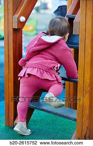 Baby playing in the park. Zumaia. Gipuzkoa. Basque Country. Spain View Large Photo Image Stock Image - Baby playing in the park. Zumaia. Gipuzkoa. Basque Country. Spain. Fotosearch