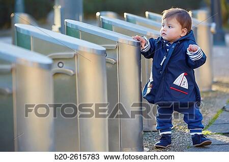 Baby playing in the park. Zumaia. Gipuzkoa. Basque Country. Spain View Large Photo Image Stock Image - Baby playing in the park. Zumaia. Gipuzkoa. Basque Country. Spain. Fotosearch