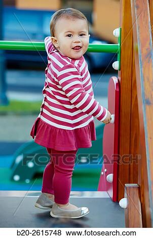 Baby playing in the park. Zumaia. Gipuzkoa. Basque Country. Spain View Large Photo Image Stock Photo - Baby playing in the park. Zumaia. Gipuzkoa. Basque Country. Spain. Fotosearch