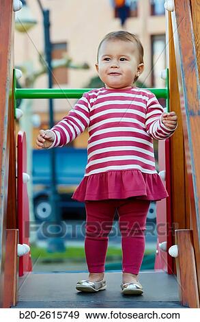 Baby playing in the park. Zumaia. Gipuzkoa. Basque Country. Spain View Large Photo Image Stock Photo - Baby playing in the park. Zumaia. Gipuzkoa. Basque Country. Spain. Fotosearch