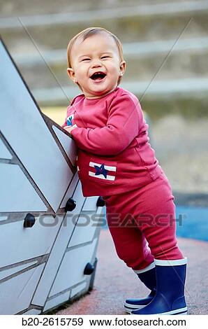 Baby playing in the park. Zumaia. Gipuzkoa. Basque Country. Spain View Large Photo Image Stock Photo - Baby playing in the park. Zumaia. Gipuzkoa. Basque Country. Spain. Fotosearch