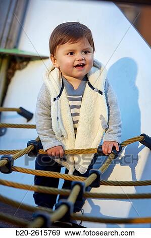 Stock Photo - Baby playing in the park. Zumaia. Gipuzkoa. Basque Country. Spain. Fotosearch