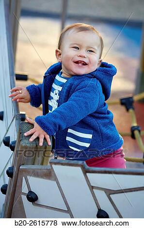 Stock Photo - Baby playing in the park. Zumaia. Gipuzkoa. Basque Country. Spain. Fotosearch