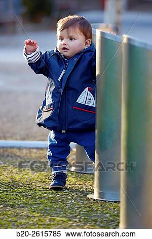 Stock Photography - Baby playing in the park. Zumaia. Gipuzkoa. Basque Country. Spain. Fotosearch