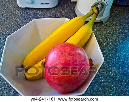 Bananas and pomegranate. View Large Photo Image Stock Image - Bananas and pomegranate.. Fotosearch