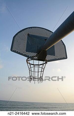Basketball hoop in front of the Mediterranean. View Large Photo Image Stock Image - Basketball hoop in front of the Mediterranean.. Fotosearch