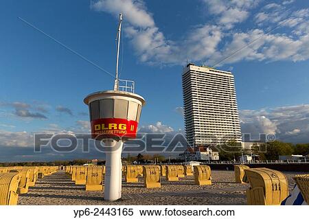 Stock Image Of Beach At The Baltic Sea With Chairs Liuard Beach At The Baltic Sea With Chairs Liuard Tower And High Rise Hotel Travem Nde Schleswig Holstein Germany