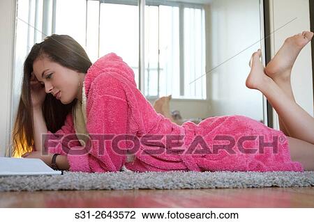 beautiful young Russian girl studying on floor View Large Photo Image Stock Image - beautiful young Russian girl studying on floor. Fotosearch