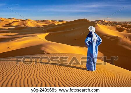 Berber man, Erg Chebbi desert near Merzouga, Sahara, Morocco. View Large Photo Image Stock Photography - Berber man, Erg Chebbi desert near Merzouga, Sahara, Morocco.. Fotosearch