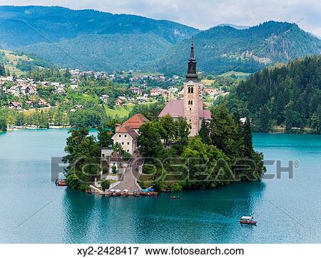 Stock Photo - Bled, Upper Carniola, Slovenia. Church of the Assumption on Bled Island.. Fotosearch