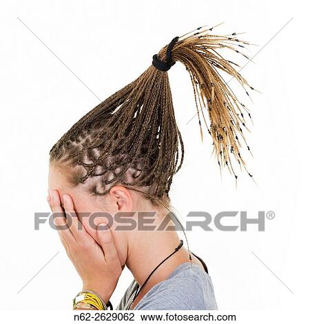 Blonde girl with braids magically raised, covers her face with her hands. View Large Photo Image Stock Image - Blonde girl with braids magically raised, covers her face with her hands.. Fotosearch