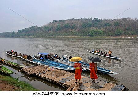 boat pier on Mekong River, Luang Prabang, Laos, Southeast Asia. View Large Photo Image Stock Photo - boat pier on Mekong River, Luang Prabang, Laos, Southeast Asia.. Fotosearch
