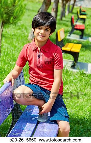 Boy playing in the park. Getaria. Gipuzkoa. Basque Country. Spain View Large Photo Image Stock Image - Boy playing in the park. Getaria. Gipuzkoa. Basque Country. Spain. Fotosearch