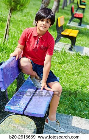 Boy playing in the park. Getaria. Gipuzkoa. Basque Country. Spain View Large Photo Image Stock Photo - Boy playing in the park. Getaria. Gipuzkoa. Basque Country. Spain. Fotosearch