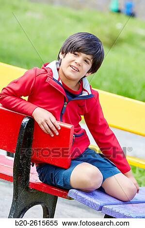Boy playing in the park. Getaria. Gipuzkoa. Basque Country. Spain View Large Photo Image Stock Photography - Boy playing in the park. Getaria. Gipuzkoa. Basque Country. Spain. Fotosearch